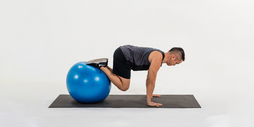 take-your-planks-to-the-next-level-with-the-stability-ball-knee-tuck